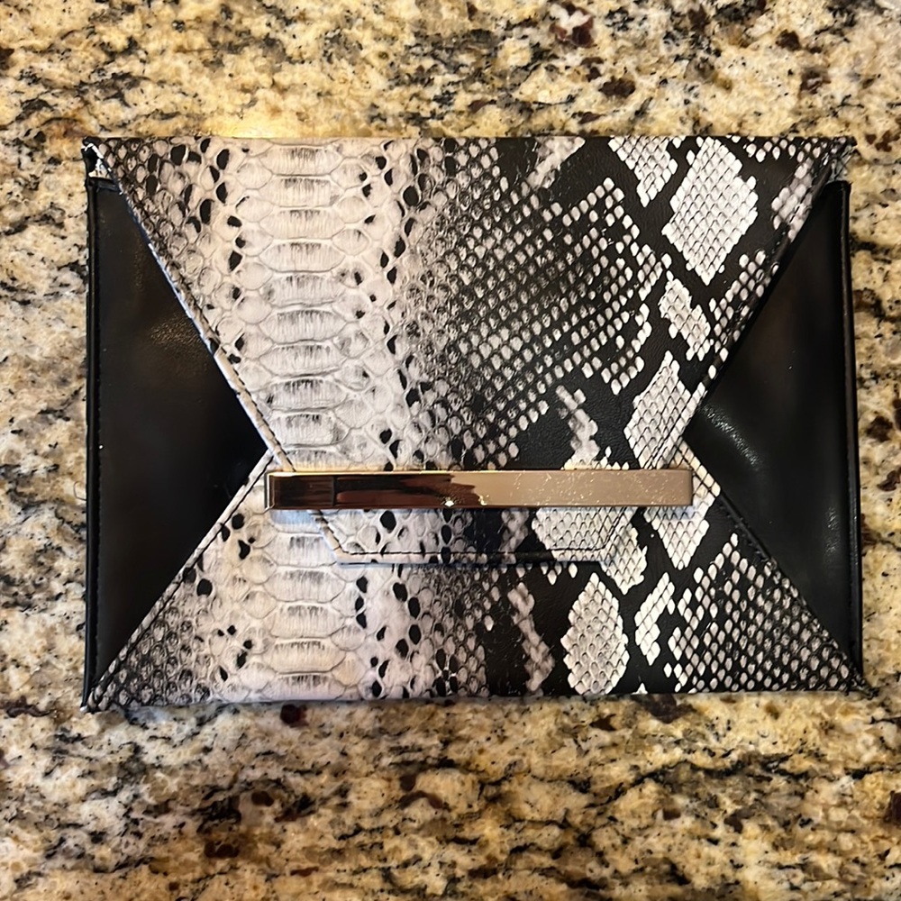 Black and white snakeskin clutch